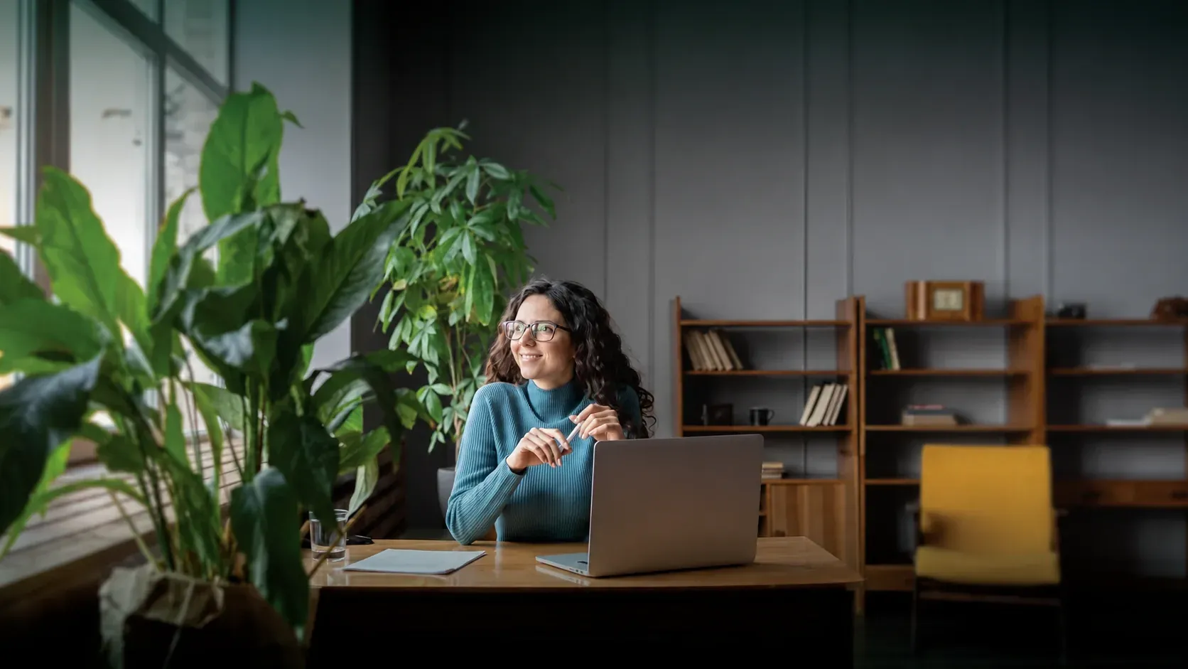 A Keener Marketing team member planning a project at her desk